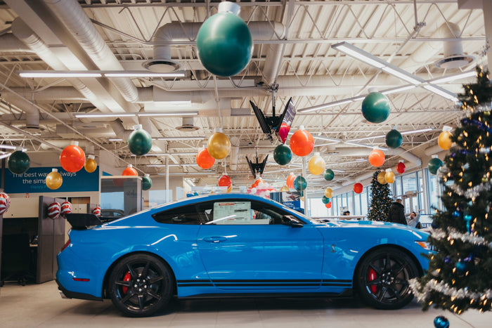 Holiday balloon installation inside the  ford dealership
