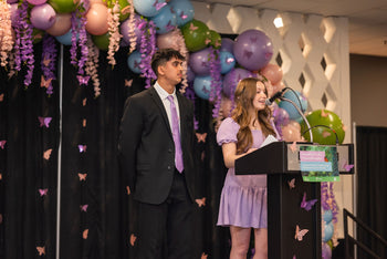 2 presenters on stage at SSCF's Women's Breakfast fundraiser